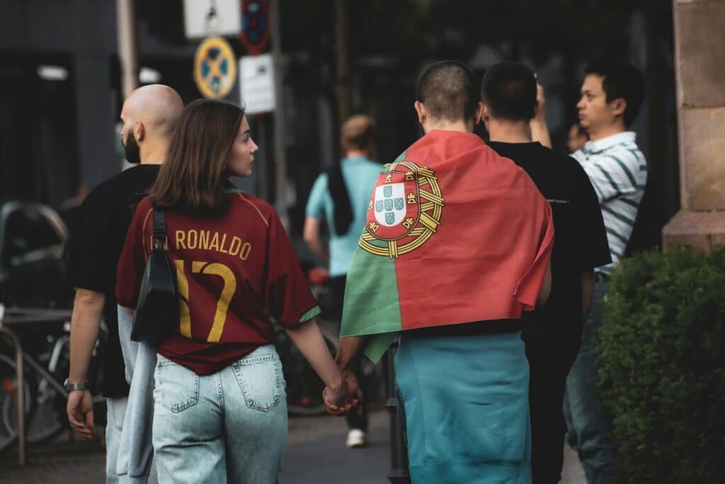A man and woman with Portugal flag